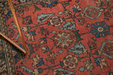 Persian Lilihan rug detail: serrated leaves, budding blossoms, powder blue, cinnabar red.