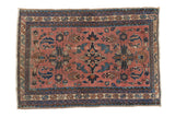 Antique Persian Lilihan rug, dusty rose field, bold quatrefoil medallion, scrolling floral vines.