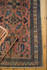 Antique Lilihan rug detail showcasing expressive serrated leaves, scrolling tendril tips, and complex borders.