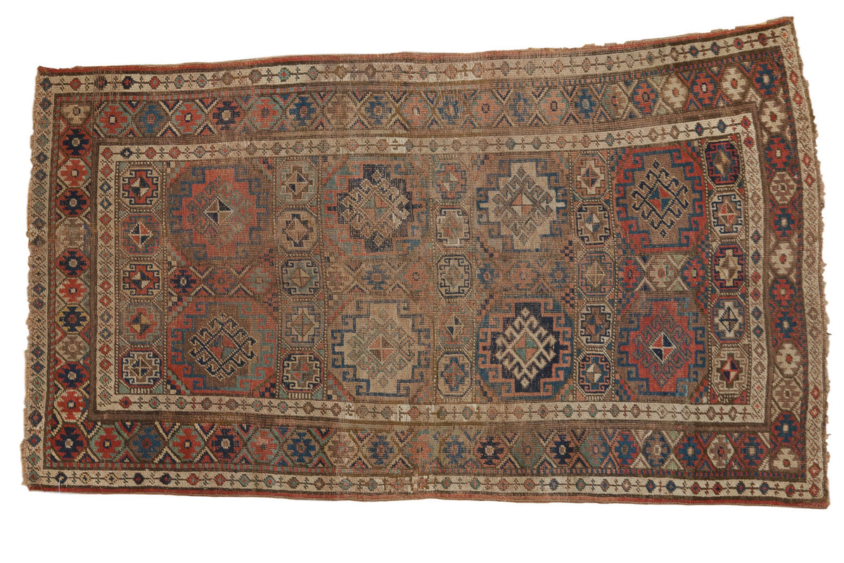 Vintage Kurdish rug, distressed geometric gul in madder red, navy, brown, 3'9" x 6'1".