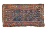 Antique Persian Fereghan rug with indigo blue floral lattice and a madder red Samovar border.