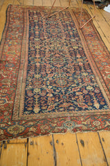 Storied edge wear, time-softened Samovar border, and indigo field of this antique Fereghan.