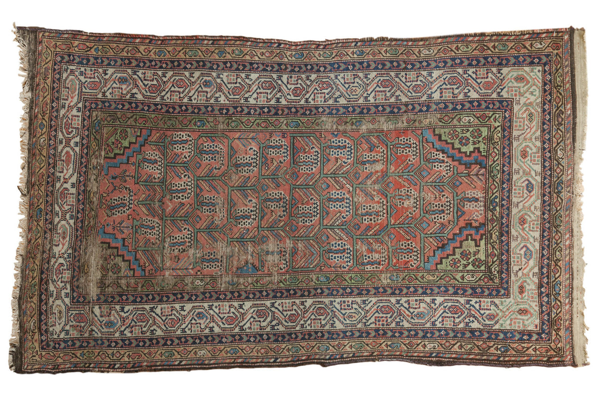 Blush Vintage Malayer rug with green, mauve paisley botehs and animal motifs in Mir Serbend border.