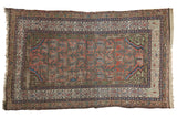 Blush Vintage Malayer rug with green, mauve paisley botehs and animal motifs in Mir Serbend border.