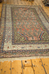 Vintage Malayer rug's detailed Mir Serbend border with meandering botehs and tattered fringe.