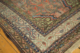 Vintage Malayer rug corner showing blush, sea foam green, and blue Mir Serbend borders with botehs.