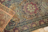 Intricate cochineal red floral motifs and low pile on antique Isfahan rug.