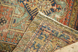 Intricate hand-knotted foundation and faded geometric patterns of an antique Karaja runner.