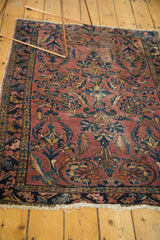 Detailed Lilihan rug with expressive floral bouquets, serrated leaves, blush, navy, and gold.