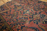 Blush vintage Lilihan rug detail, ornate navy, gold, green floral bouquets.