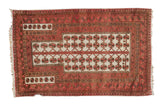Vintage Turkmen prayer rug featuring a tree of life design in blush, bronze, and ivory.