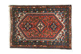 Vintage Persian Borchalou rug: unusual blush, blue, ivory medallion, Herati field, detailed borders.