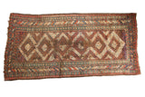 Vintage Caucasian runner rug, six concentric diamond medallions, madder red and navy blue, localized wear, 4'5