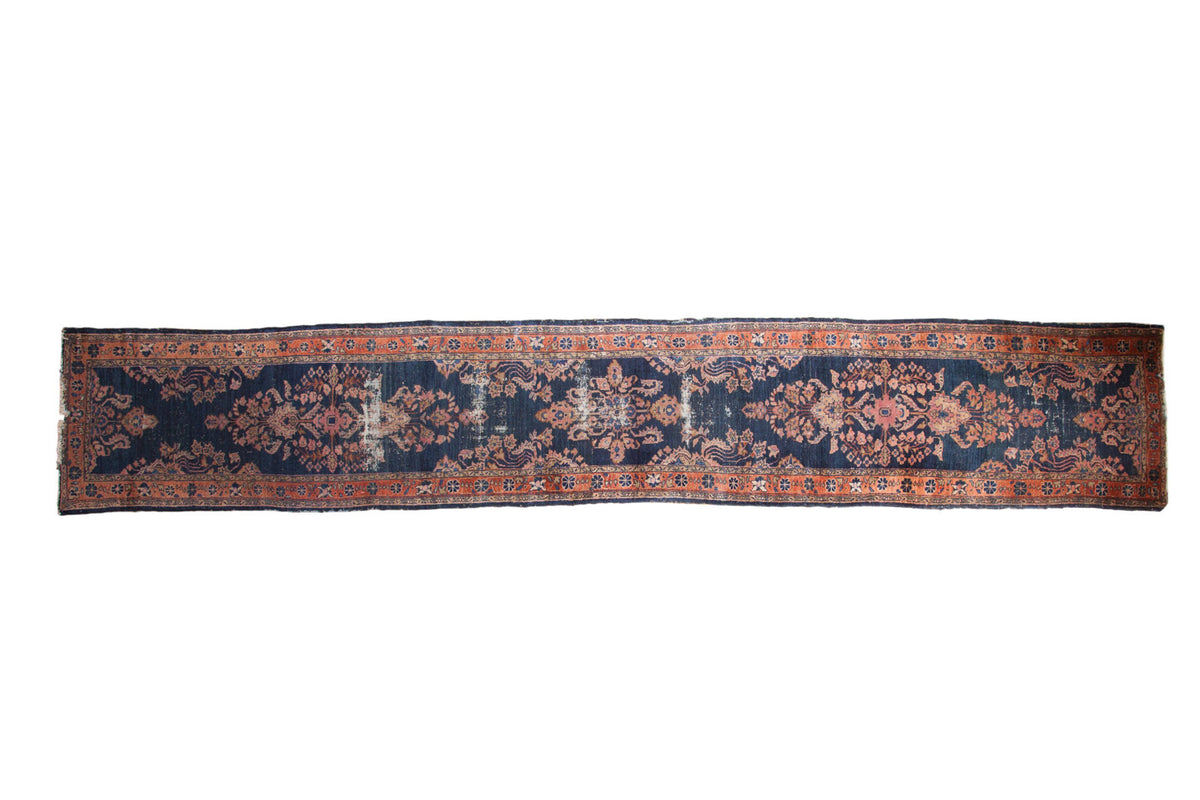 Antique Persian Lilihan runner, navy indigo ground, terra cotta floral motifs, patina, 2'8" x 15'6".