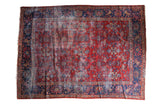Distressed vintage Mahal carpet, allover floral design on cherry red and navy blue, 9'1