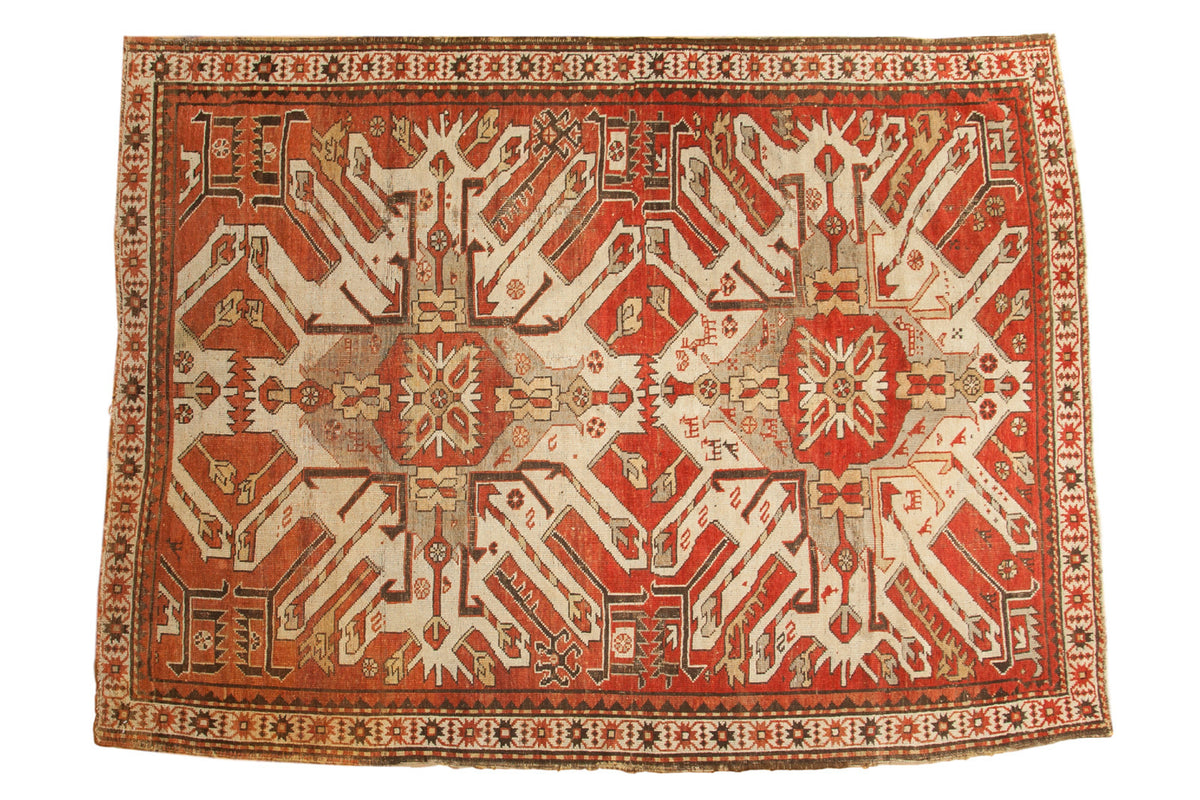 Hand-knotted vintage Kazak carpet, bold rust and ivory geometric design, circa 1930s, 5'8" x 7'7".