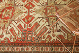 Geometric rust, ivory, and charcoal patterns on a vintage Kazak rug with narrow border.