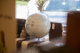 Vintage 1970s Moon Globe with detailed cratered surface and clear acrylic base.