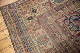 Mostly even wear showing knot heads on the corner of a late 19th-century Persian Kermanshah carpet.