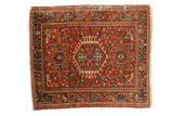 Vintage hand-knotted Karaja square rug with geometric medallion, brick red, blue, and charcoal.