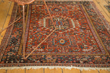Vintage Karaja square rug in brick red, displaying intricate geometric and curvilinear patterns.