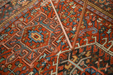 Intricate Karaja rug pattern with brick red, powder blue, and dark teal geometric stylization.
