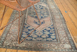 Antique Malayer rug, dusty rose elongated medallion and dark blue field Herati motif.