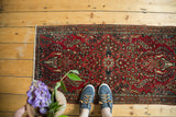 Cherry red vintage Persian Sarouk runner with vase tree of life motif.