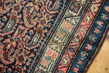 Vintage Malayer runner detail: indigo paisley boteh, blush fuchsia, sand, and sky blue borders.