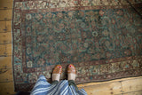 Vintage Malayer rug detail: Herati design with animals and geometric border, aubergine, navy, ivory.