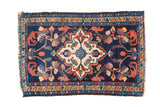Oversized ivory quatrefoil medallion on indigo blue vintage Borchalou rug, 2'x3'1