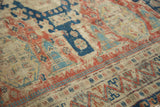 Time-softened geometric border on an antique Caucasian Soumac flatweave rug.
