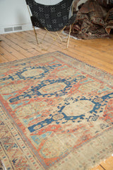 Frayed end and small center split on this antique Caucasian Soumac rug.