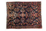 Vintage Persian Lilihan rug with allover floral design in indigo, wine red, and bronze, showing wear. 4'3