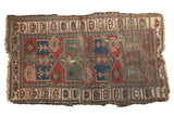 Antique Tattered Caucasian rug, geometric medallions with madder red, blue-green, and ivory. 3'9
