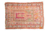 Antique Mudjur prayer rug; vibrant magenta, pistachio green, geometric borders, aged patina. 4'3