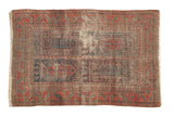 Antique Belouch rug with geometric panel design in indigo, pomegranate, charcoal. Even wear, 3'4
