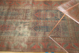 Antique Belouch rug, allover wear with restrung foundation, featuring faded indigo and red patterns.