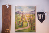 Antique folk art painting of a rural landscape, two cows, bare trees, and blue mountains.