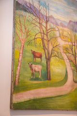 Close-up detail of antique folk art painting, featuring cows, rural road, and visible canvas edge.