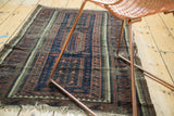 Antique Persian Belouch runner, tribal geometric triple panel design, indigo field, Laleh Abbasi borders.