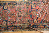 Vintage Mehriban runner detail: Mina Khani floral design with soft wear and brick red.