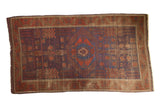 Antique Timuri Belouch rug with abrashed cobalt blue field and exotic tribal garden motifs, 4'8