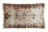 Vintage Persian Lilihan rug with exposed foundation, contrasting charcoal and dusty rose patterns.