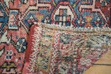 Vintage Karaja rug pile with even wear, original red selvage, and woven foundation.