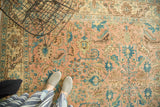 Vintage Persian Tabriz carpet with peach and blue floral palmettes and vinery.