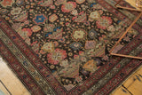Corner of antique Malayer rug, with blush rose mir boteh border and charcoal floral field.