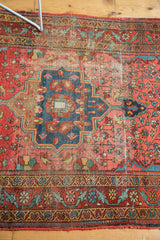 Vintage Farahan Sarouk rug's central medallion with a visible lazy line and exposed foundation.