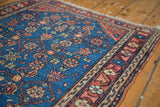 Vintage Hamadan rug: intricate Herati motif on aqua blue field, madder root red border.