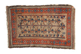 Antique Belouch camel hair rug, geometric tree-of-life design in madder red, blue, and natural camel.